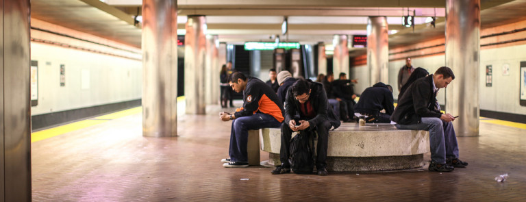 People use Wi-Fi in the Metrostation